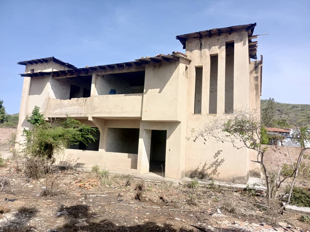 terreno y construcción en San Lorenzo