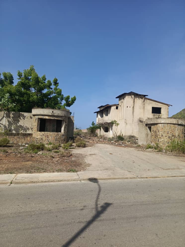 terreno y construcción en San Lorenzo