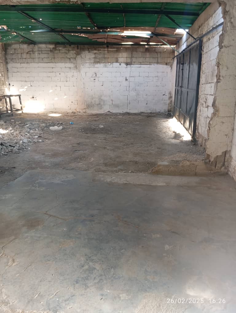 Terreno con local en construcción en Conejeros 